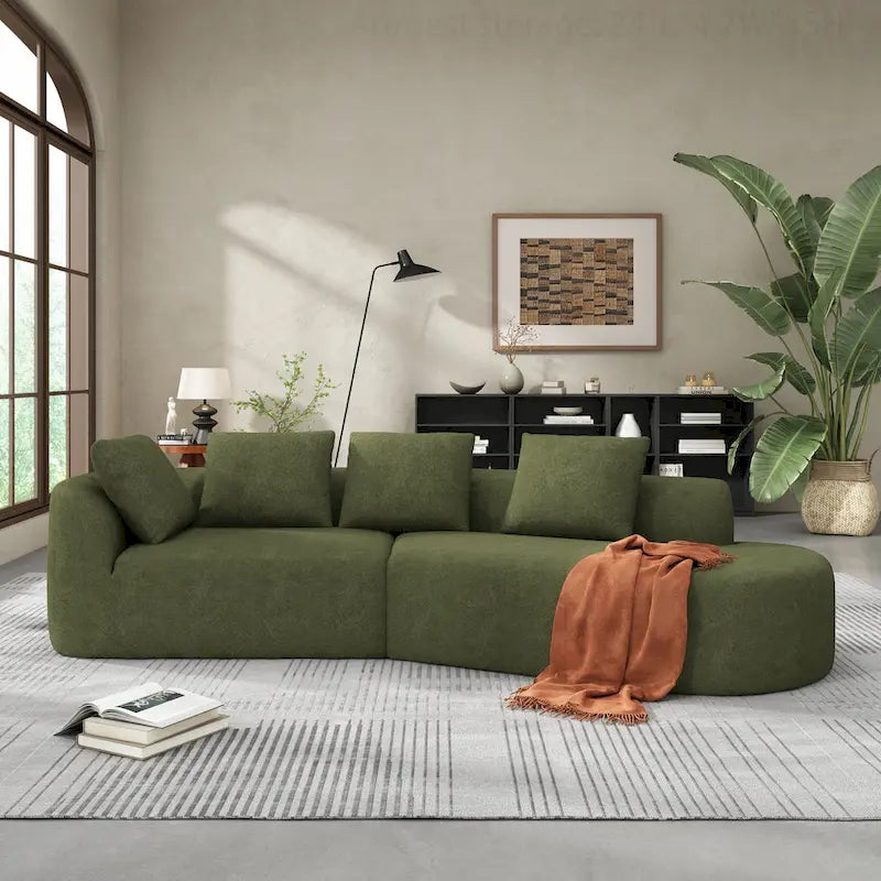 Canapé d'angle incurvé moderne avec revêtement de haute qualité et assise spacieuse