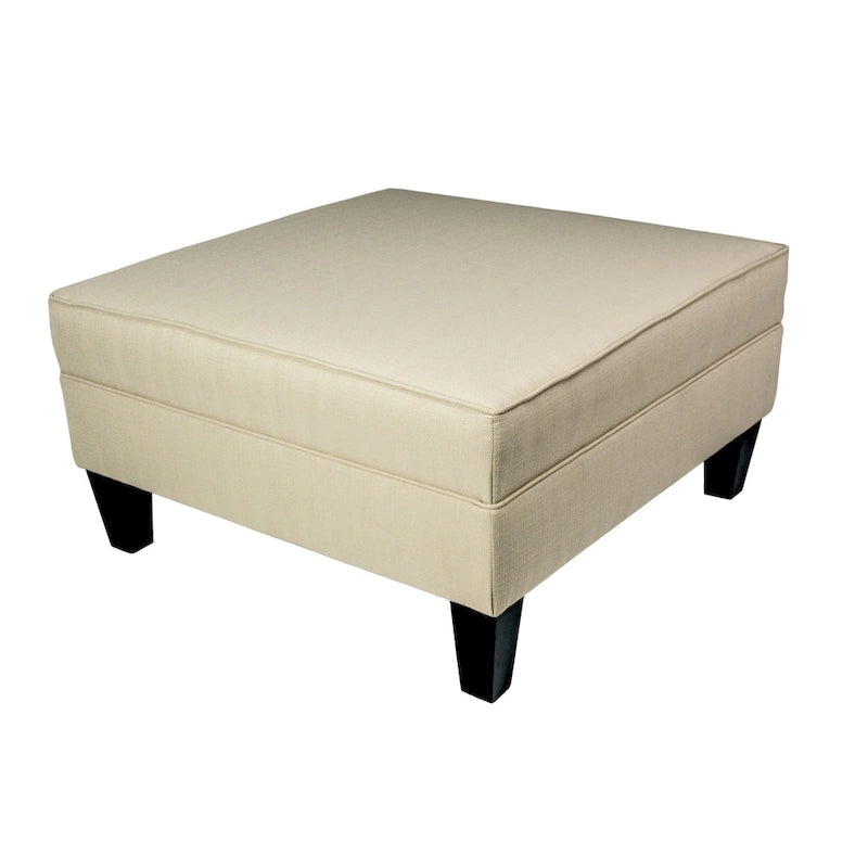 Grand pouf ottoman rembourré avec passepoil