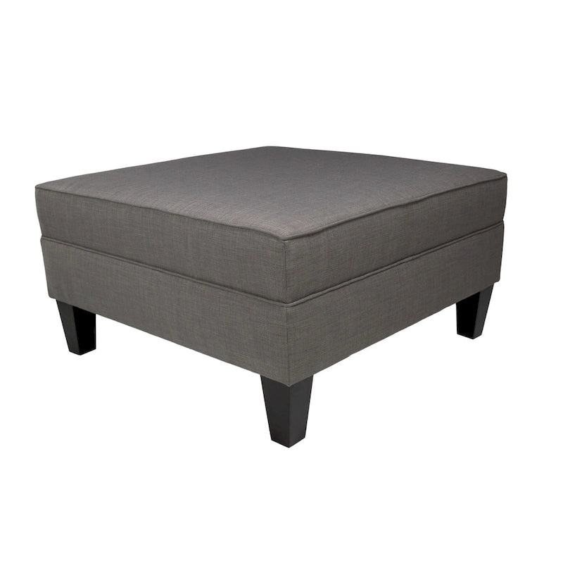 Grand pouf ottoman rembourré avec passepoil