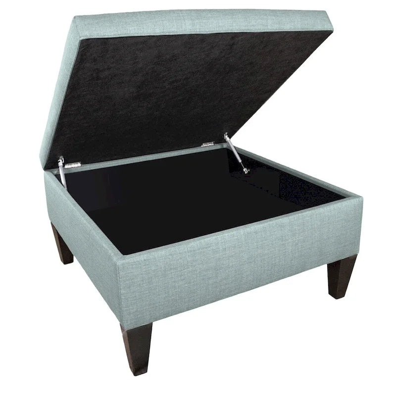 Grand pouf ottoman rembourré avec passepoil