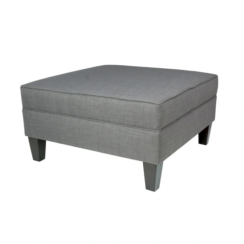 Grand pouf ottoman rembourré avec passepoil