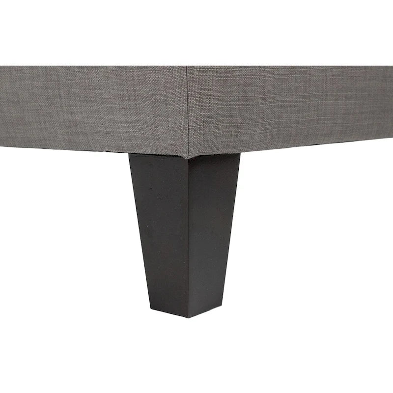 Grand pouf ottoman rembourré avec passepoil