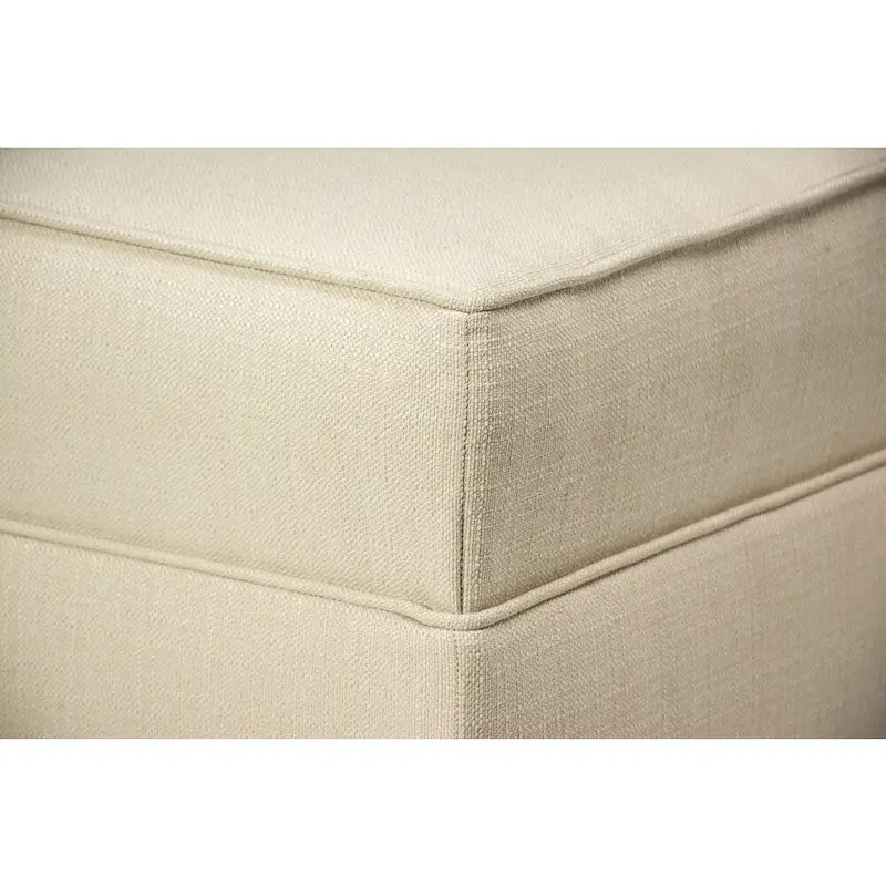 Grand pouf ottoman rembourré avec passepoil